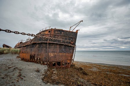 Photo for Shipwreck called Amadeo on the  coast of Magellan Strait, rusty warship wreck, Tierra Del Fuego, Chile - Royalty Free Image