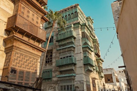 Photo for Traditional architecture of old Jeddah town El Balad district houses with wooden windows and balconies Unesco Heritage site in Jeddah Saudi Arabia - Royalty Free Image