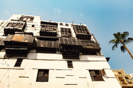 Photo for Traditional architecture of old Jeddah town El Balad district houses with wooden windows and balconies Unesco Heritage site in Jeddah Saudi Arabia - Royalty Free Image