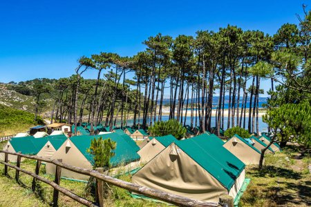 Photo for Camping on the Cies Islands Natural Park off the coast of Vigo in Galicia, Spain. The Cies campsite is 150 feet from the beach and has 800 campsite spots. - Royalty Free Image