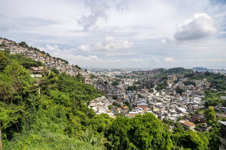 Photo for Favela of Rio de Janeiro, Brazil. Colorful houses in a hill. Zona Sul of Rio. Poor neighborhoods of the city. - Royalty Free Image