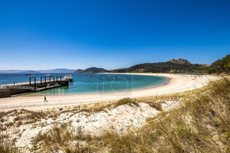 Photo for Cies Islands, Spain - Jul 01, 2023: Beach of Rodas in Cies Islands nature reserve, white sand and clear turquoise water. Atlantic Islands of Galicia National Park, Spain. - Royalty Free Image