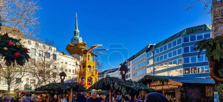 Photo for Munich, Germany - Dec 18, 2023: Christmas market at Rindermarkt in Munich, Bavaria, Germany in Europe - Royalty Free Image
