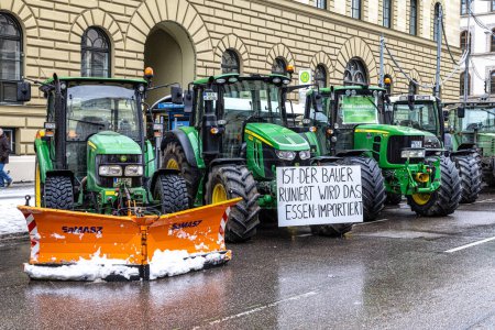 Photo for Munich, Germany - Jan 08, 2024: A big manifestation of farmers collapses the city of Munich. They fight for a price worthy of their work at Odeonsplatz in Munich, Germany. - Royalty Free Image