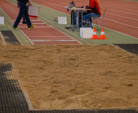Photo for Long jump facility - long jump pit in an athletics hall - Royalty Free Image