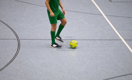 Futsal indoor football and Sports hall floor in a sports hall with various pitch lines
