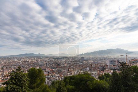 Photo for Fluffy clouds over the city - Royalty Free Image