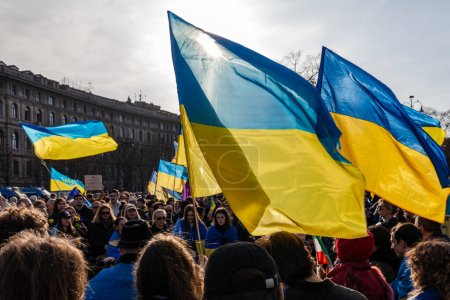 Photo for MILAN, ITALY - FEBRUARY 25, 2023: One year after Russia-Ukraine war, 1st anniversary. Rally of the population in support of Ukraine in Milan, Castello Sforzesco. - Royalty Free Image