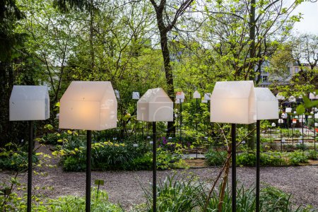 MILAN, ITALY - April 2018: Installation transforms the Brera Botanical Garden into a green city, during the design week. House in motion exhibition promoted by the design magazine Interni for a smart town. 