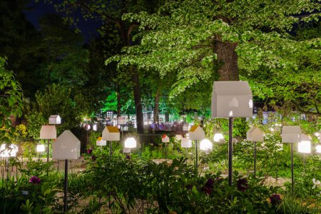 MILAN, ITALY - April 2018: Installation transforms the Brera Botanical Garden into a green city, during the design week. House in motion exhibition promoted by the design magazine Interni for a smart town. 