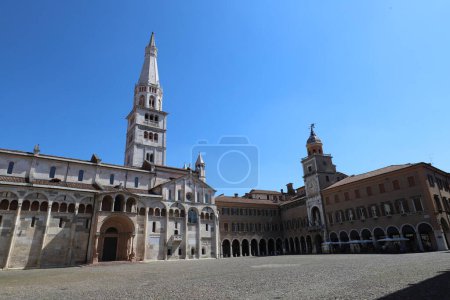 Photo for Modena, Emilia Romagna, Italy, Ghirlandina tower and Unesco cathedral on the Piazza Grande (Big Square), historical city center, touristic place - Royalty Free Image