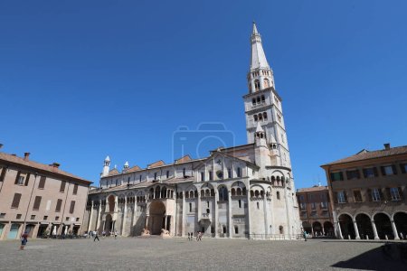 Photo for Modena, Emilia Romagna, Italy, Ghirlandina tower and Unesco cathedral on the Piazza Grande (Big Square), historical city center, touristic place - Royalty Free Image