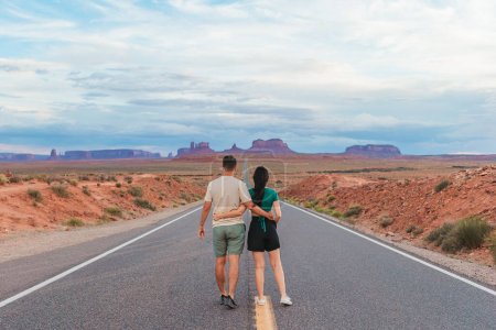 Photo for Scenic highway in Monument Valley Tribal Park in Utah. Young family on famous road in Monument Valley. Amazing view of the Monument valley. - Royalty Free Image