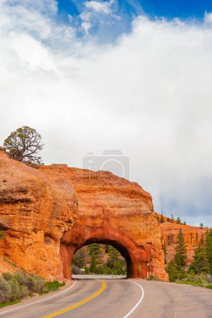 Natural stone arch in Red Canyon, Dixie National Forest, Utah, United States. Red Canyon Arch located on Highway in Utah
