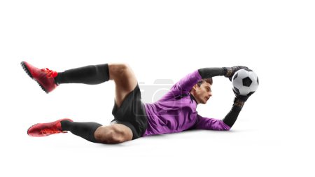 Photo for Goalkeeper in action. Soccer. Goalkeeper catching ball. The concept of sport. Isolated in white background. Sport - Royalty Free Image