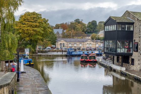 Photo for Looking down on Skipton canal basin from Belmont Bridge in Skipton in Octobwer 2022. - Royalty Free Image