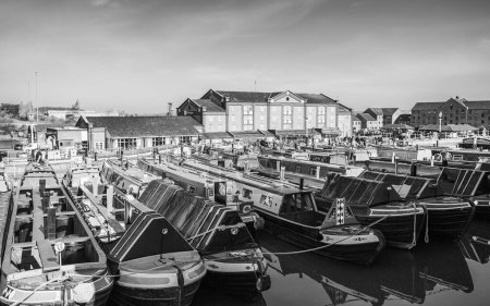 Photo for A black and white image of narrow boats in Ellesmere Port basin seen during the Easter Boat Gathering in April 2023. - Royalty Free Image