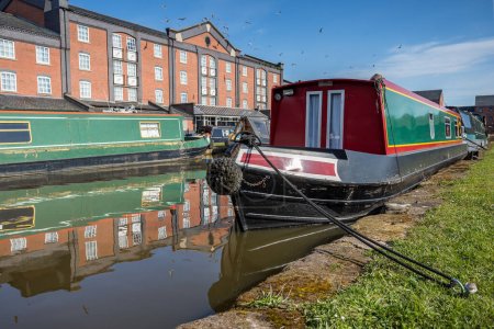 Photo for A narrow boat tied to the waters edge at Ellesmere Canal in April 2023. - Royalty Free Image