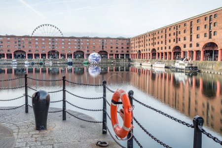Photo for The Floating Earth sculpture in the Royal Albert Dock in Liverpool captured in May 2023 as part of hosting the Eurovision Song Content. - Royalty Free Image