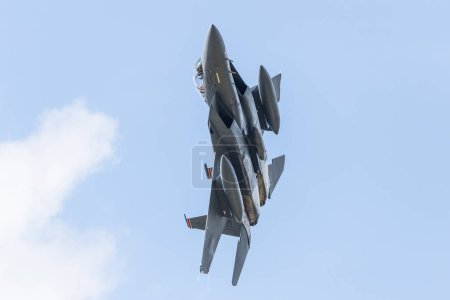Photo for An F-15E Strike Eagle assigned to the  494th Fighter Squadron launches from RAF Lakenheath in Suffolk on its way to complete a training sortie in August 2023. - Royalty Free Image