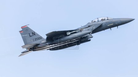 Photo for An F-15E Strike Eagle from the 494th Fighter Squadron or Panthers departs RAF Lakenheath in Suffolk on a training sortie in August 2023. - Royalty Free Image