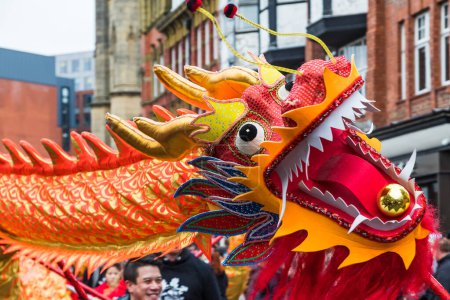 Photo for Close up of the beautifully decorated dragon performing its traditional Chinese New Year dragon dance in Liverpool seen on 11 February 2024. - Royalty Free Image