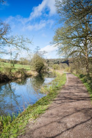 A view along the tow path on the Cromford Canal in springtime near Matlock.