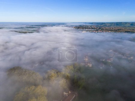 Aerial view of Bordeaux vineyard at sunrise spring under fog, Loupiac, Gironde, France. High quality photo