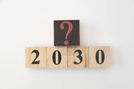 Photo for Number 2030 and question mark written on wooden blocks isolated on white background. - Royalty Free Image