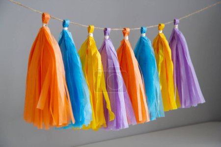 bright paper tassel garland for holiday decor