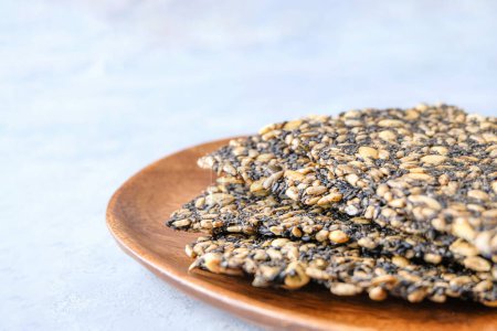 Seed crackers on neutral background with copy space