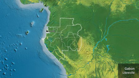 Téléchargez les photos : Gros plan sur la frontière gabonaise et ses frontières régionales sur une carte topographique. Point capital. Décrivez la forme du pays. Nom anglais du pays et de sa capitale - en image libre de droit