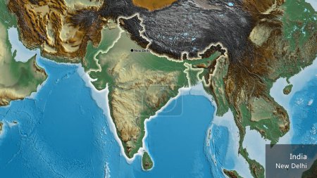 Foto de Primer plano de la zona fronteriza de la India en un mapa de relieve. Punto capital. Brillan alrededor de la forma del país. Nombre inglés del país y su capital - Imagen libre de derechos