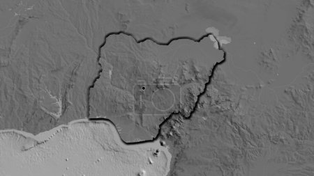 Foto de Primer plano de la zona fronteriza de Níger en un mapa bilevel. Punto capital. Bordes biselados de la forma del país. - Imagen libre de derechos