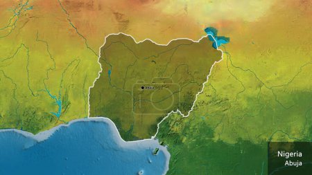 Foto de Primer plano de la zona fronteriza de Níger, destacando con una oscura superposición en un mapa topográfico. Punto capital. Esquema alrededor de la forma del país. Nombre inglés del país y su capital - Imagen libre de derechos