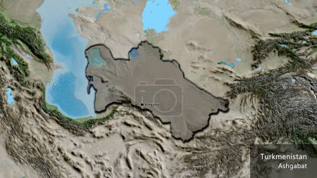 Photo for Close-up of the Turkmenistan border area highlighting with a dark overlay on a satellite map. Capital point. Bevelled edges of the country shape. English name of the country and its capital - Royalty Free Image
