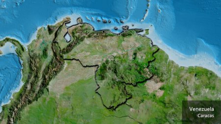 Foto de Primer plano de la zona fronteriza de Venezuela en un mapa satelital. Punto capital. Bordes biselados de la forma del país. Nombre inglés del país y su capital - Imagen libre de derechos