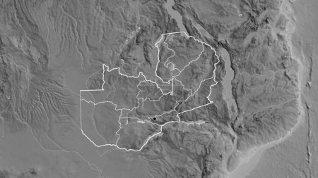Photo for Close-up of the Zambia border area and its regional borders on a grayscale map. Capital point. Outline around the country shape. - Royalty Free Image