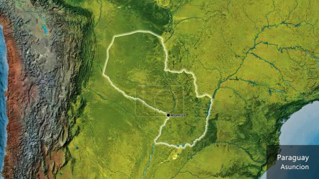 Foto de Primer plano de la zona fronteriza de Paraguay en un mapa topográfico. Punto capital. Brillan alrededor de la forma del país. Nombre inglés del país y su capital - Imagen libre de derechos
