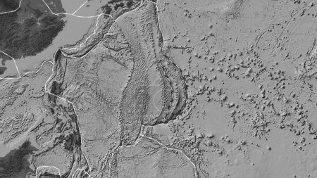 Foto de Área de la placa tectónica de Mariana marcada con una línea discontinua en un mapa de elevación bilevel en la proyección cilíndrica Patterson - Imagen libre de derechos