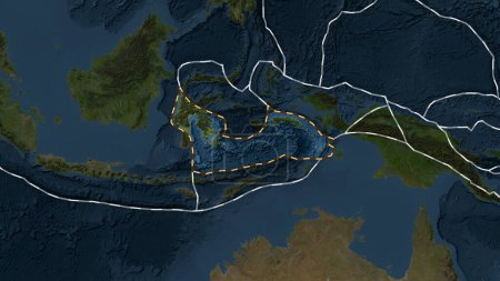 Téléchargez les photos : Zone de la plaque tectonique de la mer de Banda marquée d'une ligne pointillée sur le fond d'une carte d'imagerie satellite obscurcie dans la projection cylindrique Patterson - en image libre de droit
