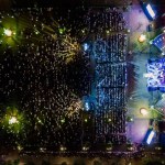 People at night open air concert aerial view. 