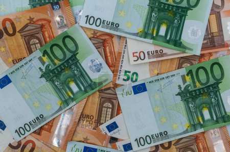 Photo for Pile of 100 and 50 euro banknotes close-up. - Royalty Free Image