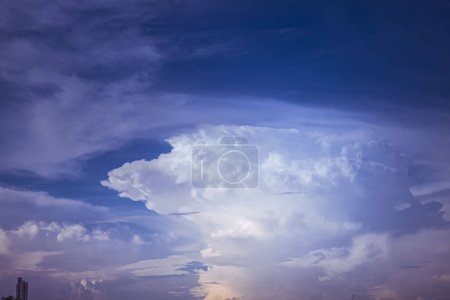 Photo for Puffy Pillows: Soft Clouds in a Sea of Blue - Royalty Free Image
