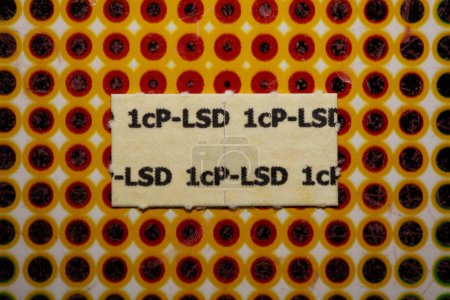 Foto de White self made lsd papers colorful drugs macro background and wallpapers in super fine high quality psychedelic hippie indigo trance prints - Imagen libre de derechos