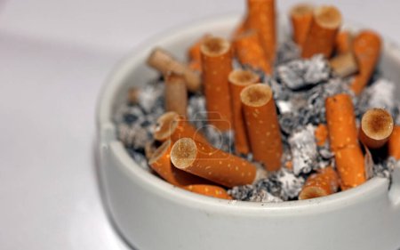 Full ashtray of cigarettes close up macro view smoking habits hi-res stock photography and images high quality big size instant downloads