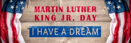"I Have A Dream" Quote From Martin Luther King Jr. On Wooden Background With American Flag  - Equality And Freedom For African Americans