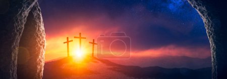 Photo for View From Empty Tomb At Sunrise With Three Crosses On Hill In The Distance - The Death, Burial And Resurrection Of Jesus Christ - Royalty Free Image