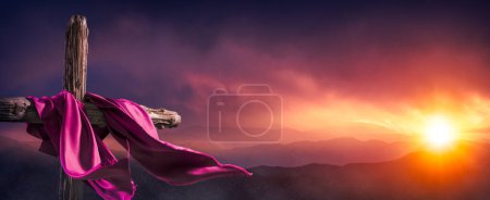 Photo for Flowing Scarlet Robe On Wooden Cross At Sunrise - The Resurrection Morning Of Jesus Christ - Royalty Free Image