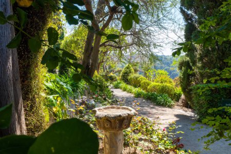 Saint-Jean-Cap-Ferrat - May 3, 2022: One of the garden alley at the Villa Ephrussi de Rothschild. Taken on a sunny spring day with no people